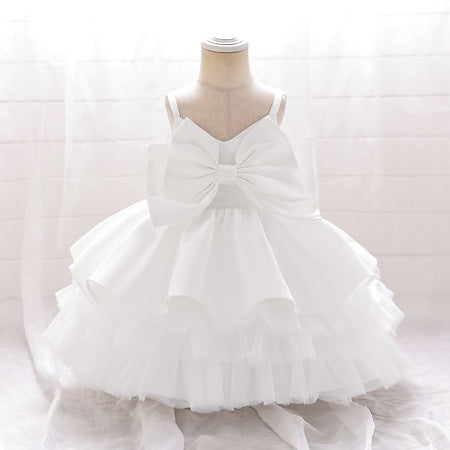 White bow flower girl gown with layered tulle skirt, elegant flower girl dress Australia.