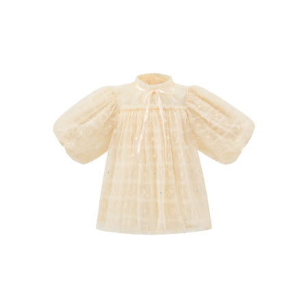 Flat lay of champagne puff sleeve flower girl dress, elegant flower girl outfit Australia.