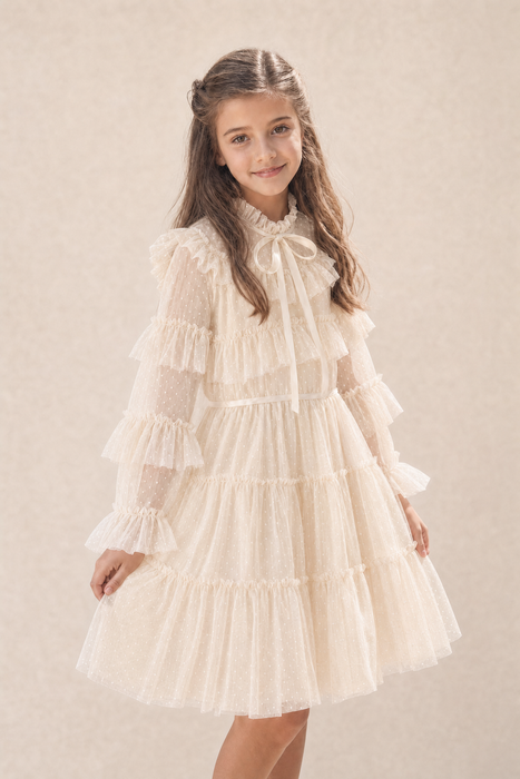 Girl modelling an ivory white long sleeve formal dress for special occasions