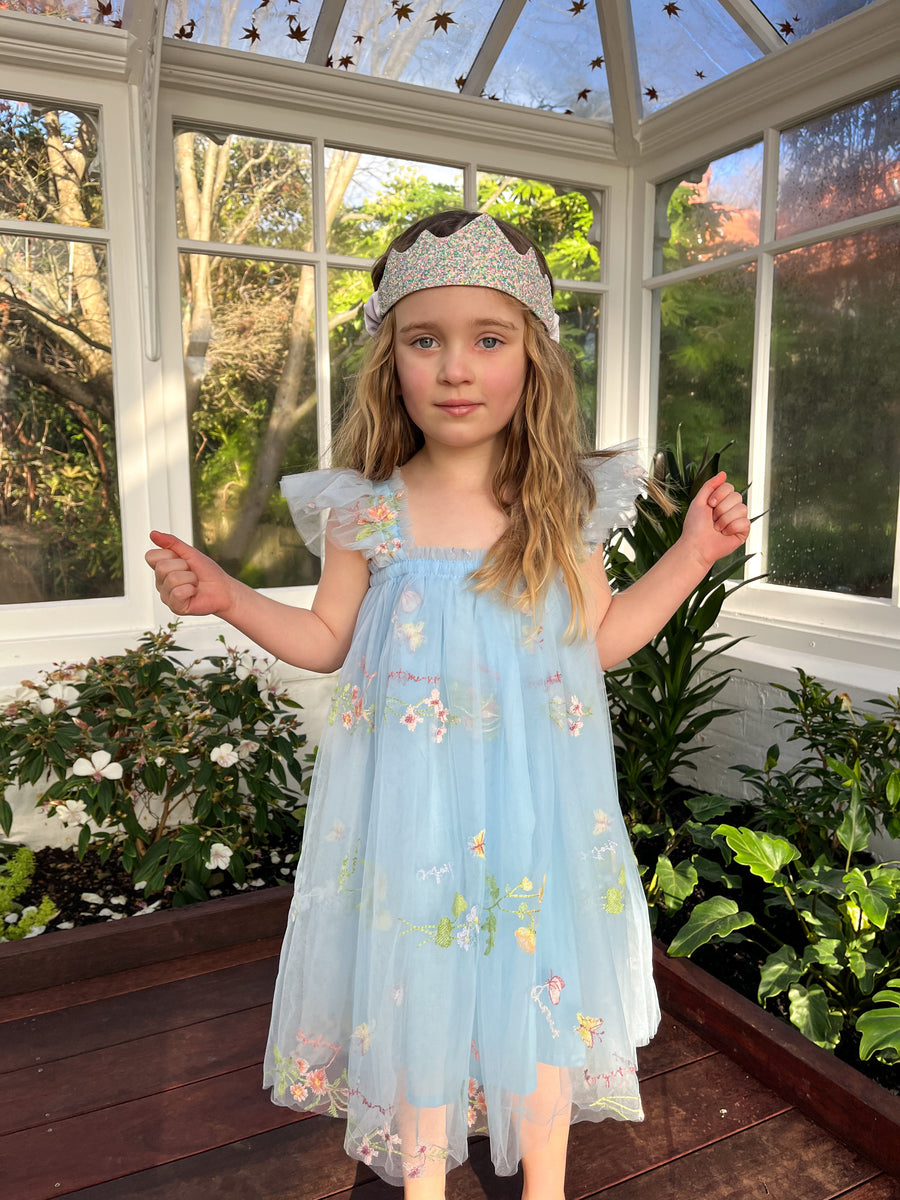 Girl in blue floral tutu dress with embroidered flowers, elegant girls tutu dress Australia.