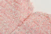 close-up of pink tweed texture with shimmer detail for girls dress
