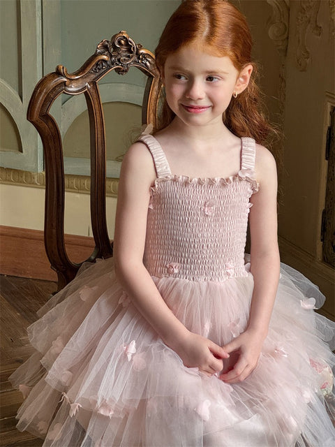 Girl in pink tutu dress with layered tulle skirt, elegant girls tutu dress Australia for birthdays and weddings.