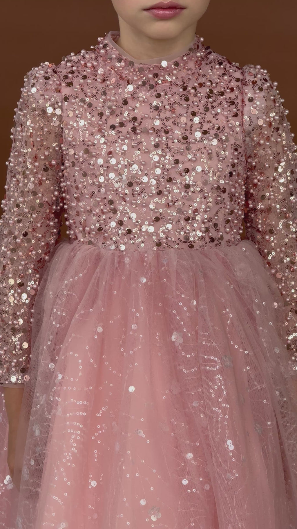Front detail of beaded sequin bodice and voluminous tulle skirt