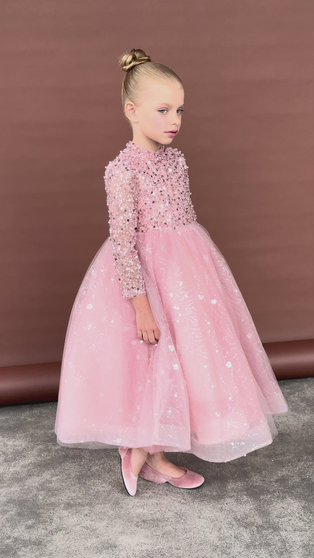 Elegant pink tulle dress with pearl, sequin, and glitter detail for girls